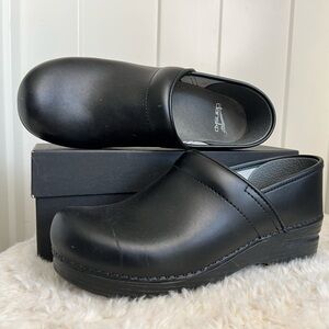Dansko Black Leather Slip-On Clogs
